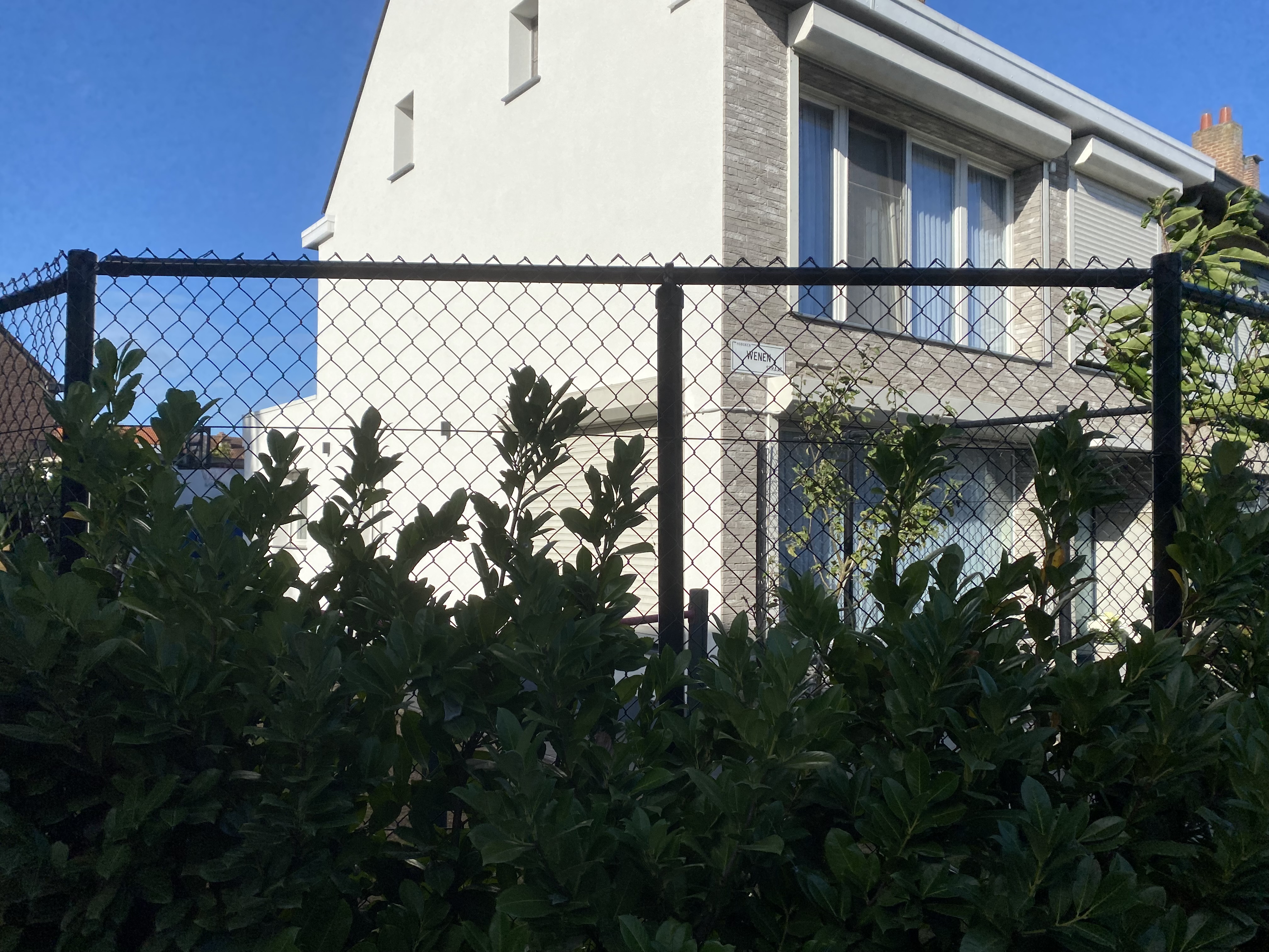 Dakisolatie, gevelrenovatie en buitenaanleg - Hoboken